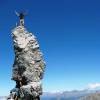 Bergsteiger auf dem Steinmandl
