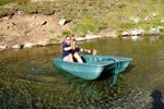 Paddelboot auf dem See vor der Htte
